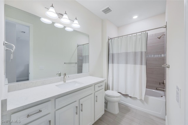 full bathroom with toilet, visible vents, shower / bath combination with curtain, and vanity