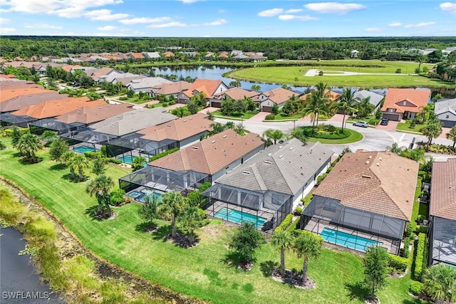 aerial view featuring a water view and a residential view