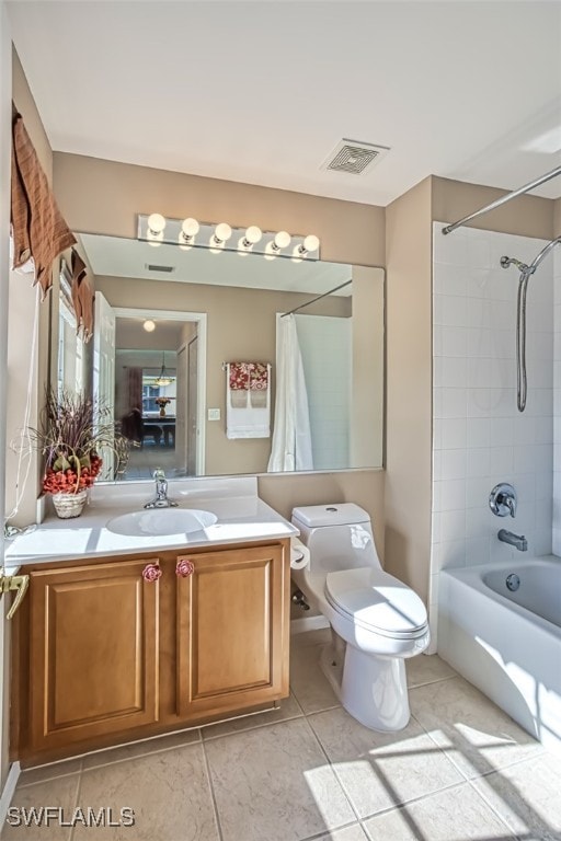 full bathroom featuring shower / bath combination with curtain, vanity, tile patterned flooring, and toilet