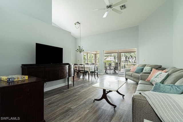 25202 Golf Lake Cir, Bonita Springs, FL 34135 - living room featuring ceiling fan with notable chandelier, high vaulted ceiling, baseboards, dark wood-style floors, and visible vents