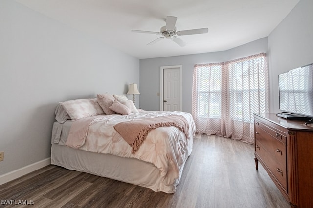 bedroom featuring ceiling fan and hardwood / wood-style floors