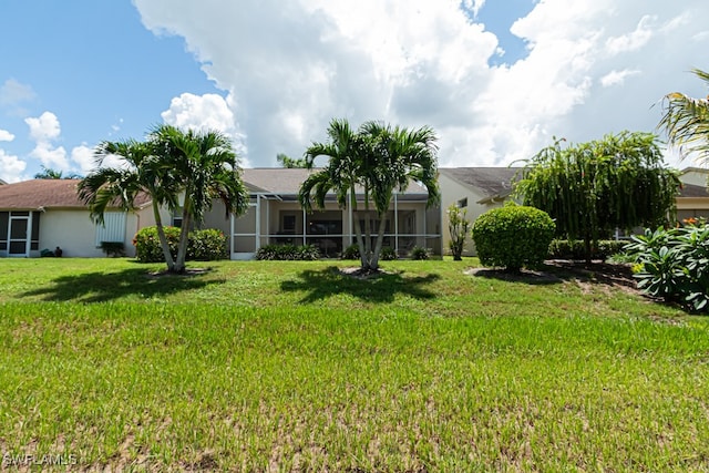 view of yard featuring a lanai