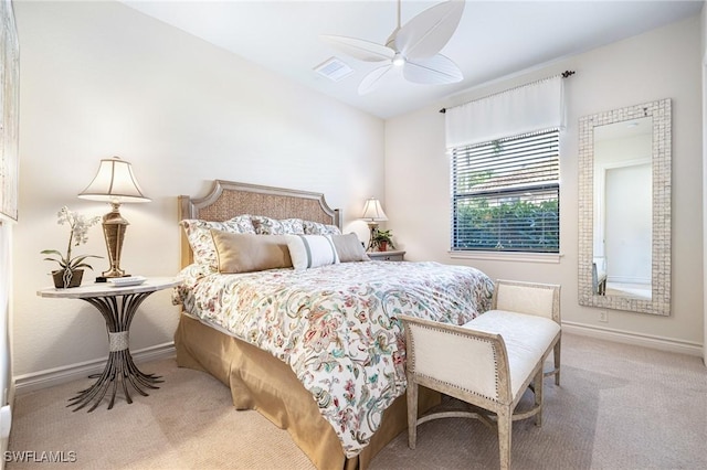 carpeted bedroom with ceiling fan, visible vents, and baseboards