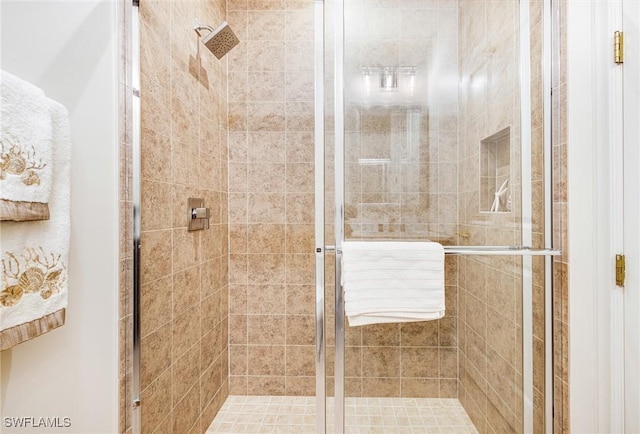 bathroom with a stall shower