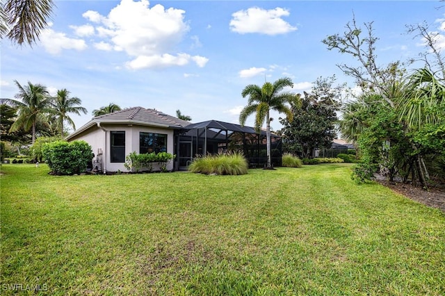 view of yard featuring a lanai