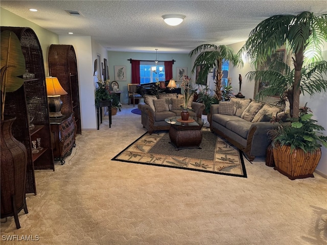 living room featuring light colored carpet, an inviting chandelier, and a textured ceiling