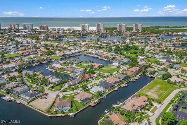 aerial view featuring a water view and a residential view