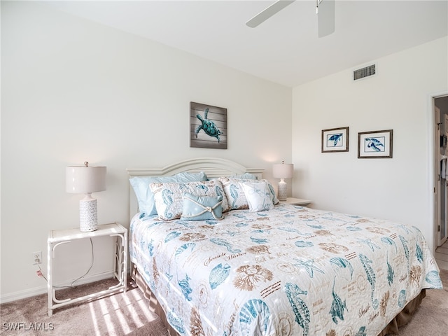 bedroom with ceiling fan and carpet flooring