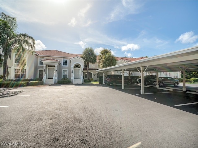 view of car parking with a carport