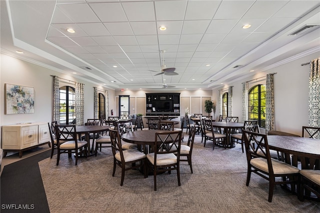 dining room featuring ornamental molding and ceiling fan