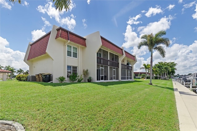 view of building exterior featuring central AC