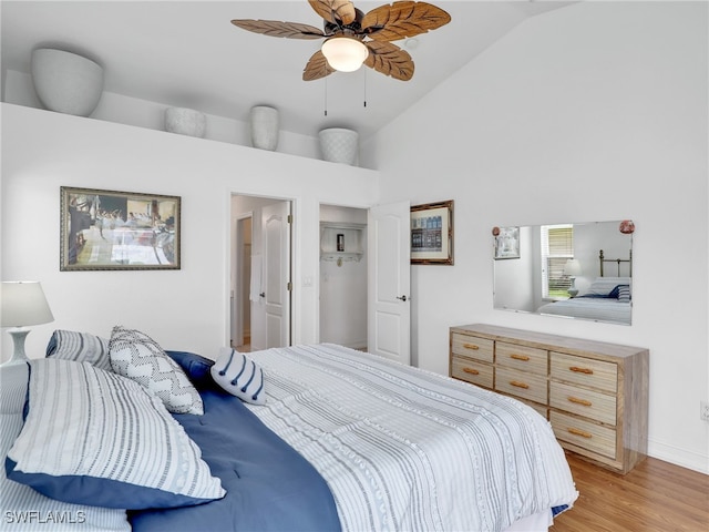 bedroom featuring high vaulted ceiling, ceiling fan, and light hardwood / wood-style floors