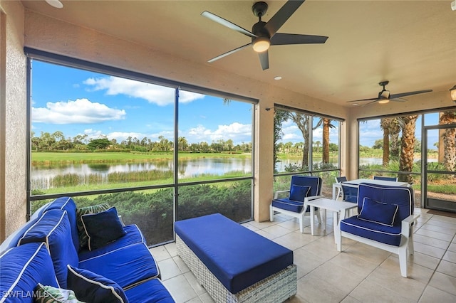 9525 Ironstone Ter Unit 102, Naples, FL 34120 - sunroom / solarium featuring a water view and ceiling fan