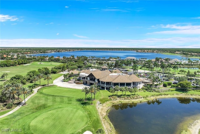 aerial view with a water view and view of golf course