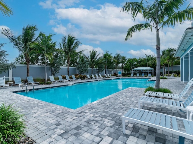 view of swimming pool featuring a patio