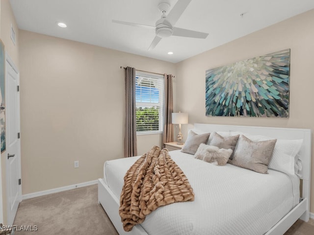 carpeted bedroom with ceiling fan