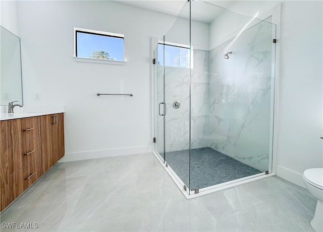 bathroom featuring walk in shower, vanity, and toilet