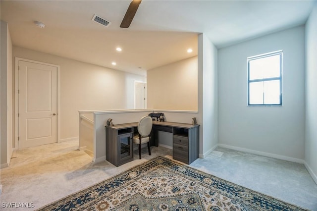 office area featuring recessed lighting, light colored carpet, visible vents, and baseboards