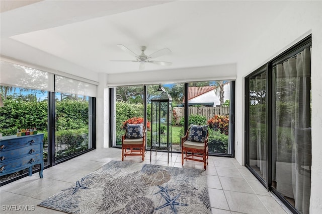 sunroom / solarium with ceiling fan