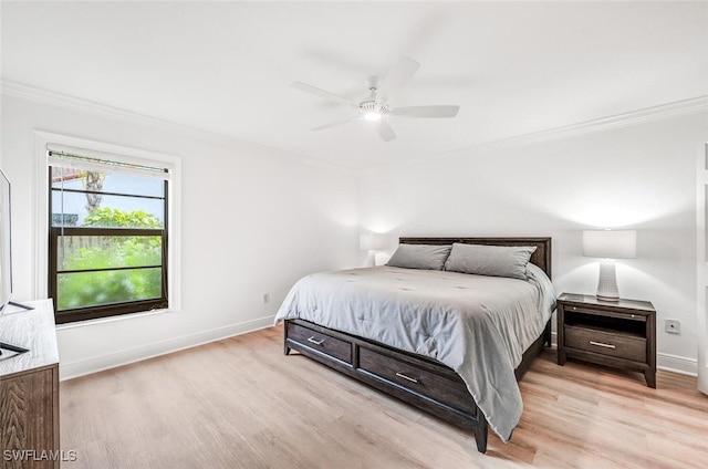 bedroom with ceiling fan, light wood-type flooring, baseboards, and ornamental molding