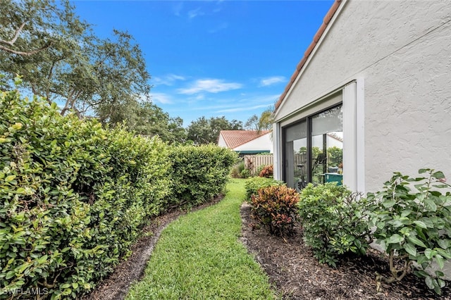 view of yard featuring fence