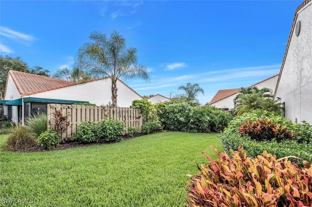 view of yard with fence