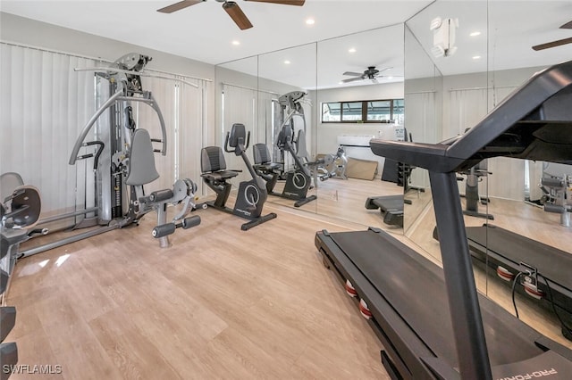 exercise room with recessed lighting, wood finished floors, and ceiling fan