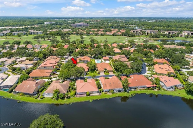 bird's eye view with a residential view and a water view