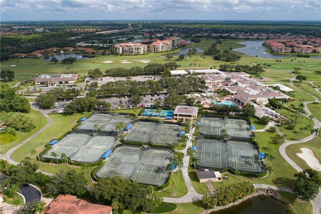 aerial view with a water view and golf course view