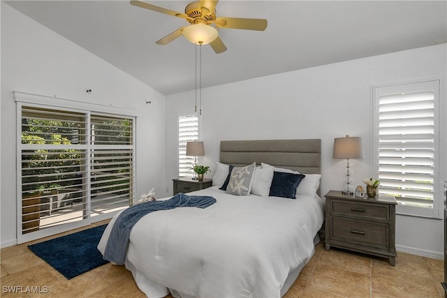 bedroom with lofted ceiling, ceiling fan, and baseboards