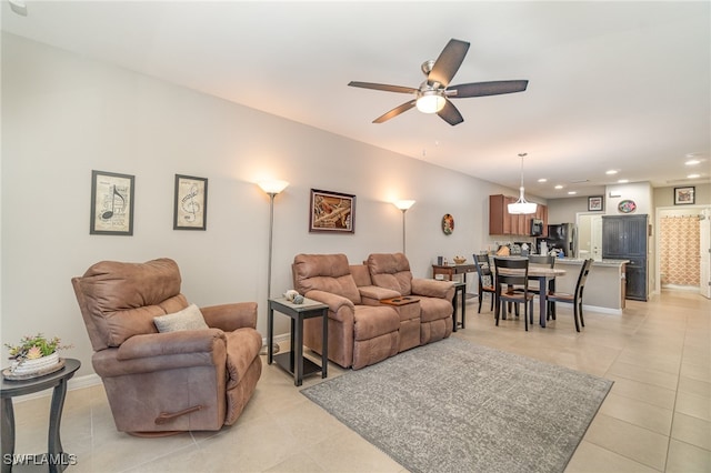 tiled living room featuring ceiling fan