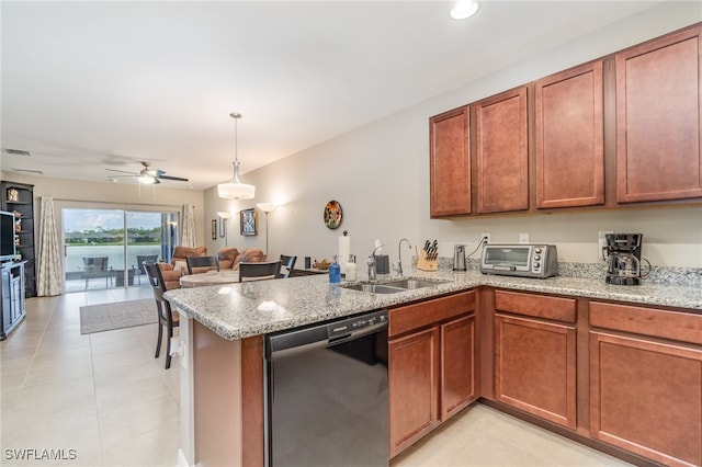 kitchen with light stone countertops, ceiling fan, sink, stainless steel dishwasher, and kitchen peninsula