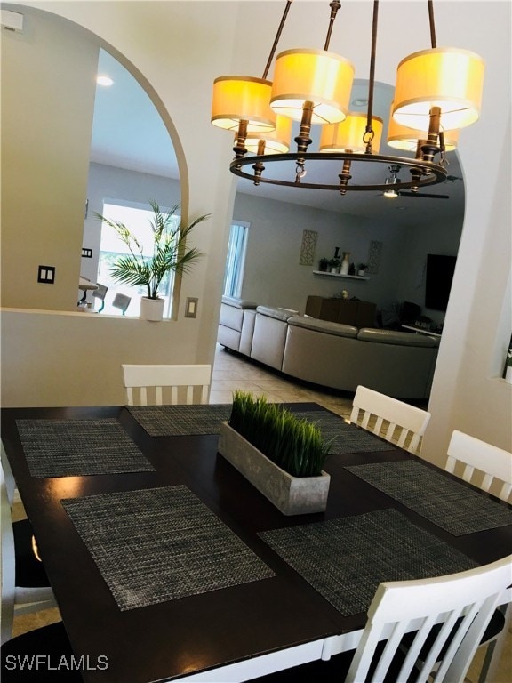 dining space featuring a notable chandelier