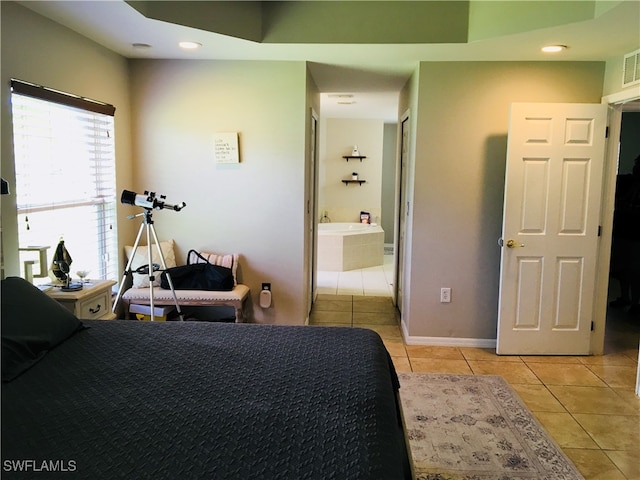 tiled bedroom with ensuite bath