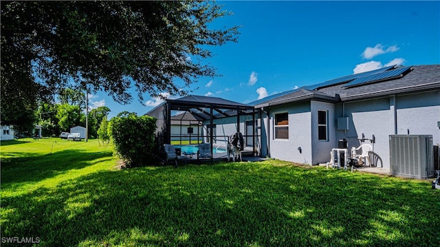 view of yard featuring glass enclosure, cooling unit, and a pool