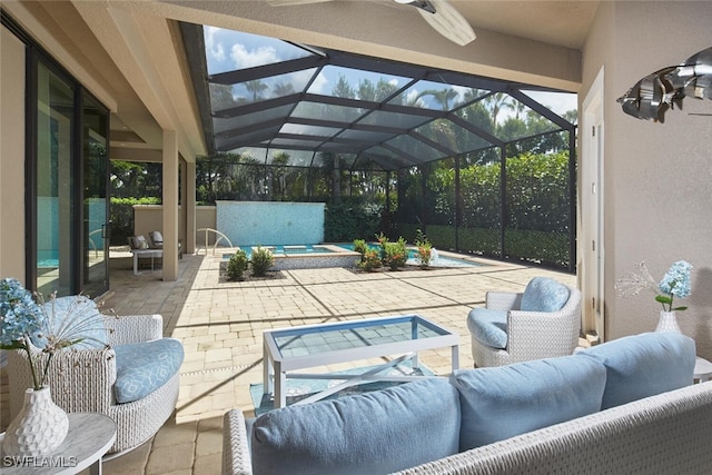 view of patio / terrace with glass enclosure, an outdoor hangout area, and a swimming pool with hot tub