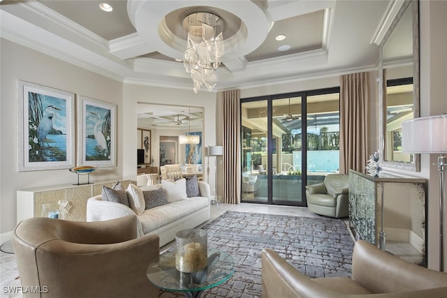 living room with coffered ceiling, ornamental molding, and ceiling fan with notable chandelier