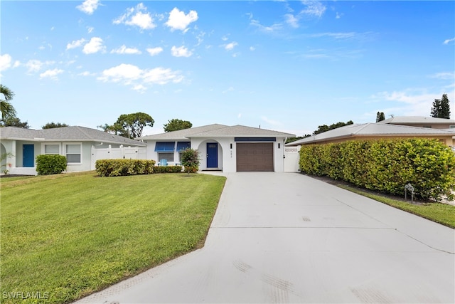 single story home with a front lawn and a garage