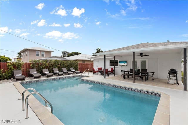 view of pool featuring a patio and ceiling fan