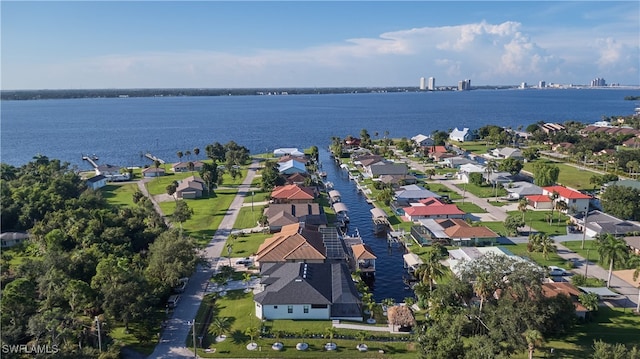 birds eye view of property featuring a water view