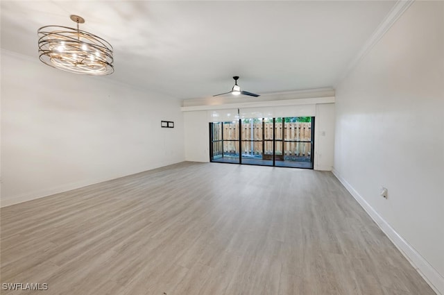 unfurnished room with light wood finished floors, baseboards, crown molding, and ceiling fan with notable chandelier