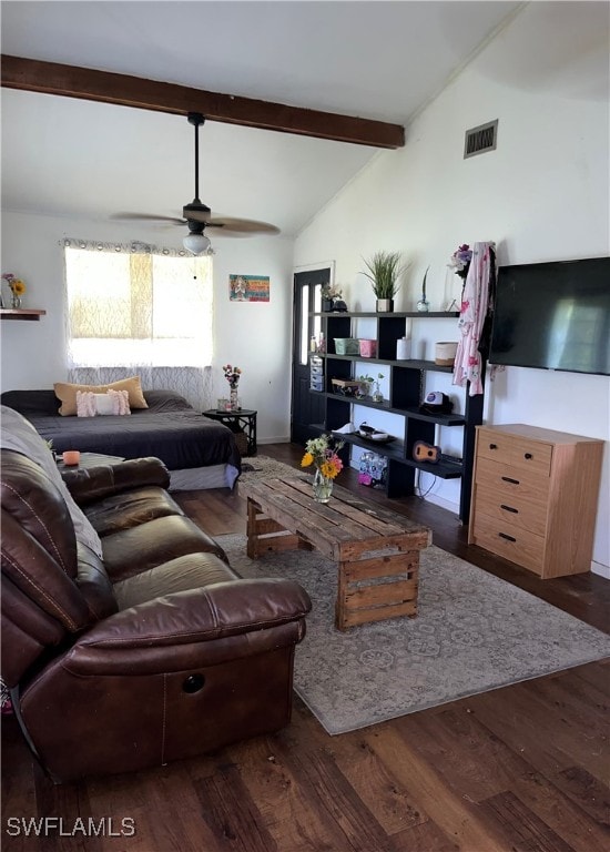 living room featuring ceiling fan, dark hardwood / wood-style floors, and vaulted ceiling with beams