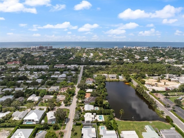 drone / aerial view with a water view