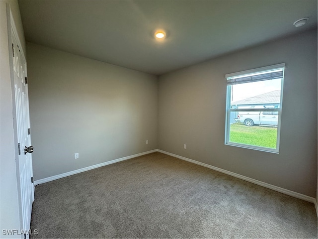 view of carpeted spare room