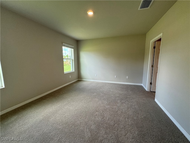 unfurnished room featuring carpet floors