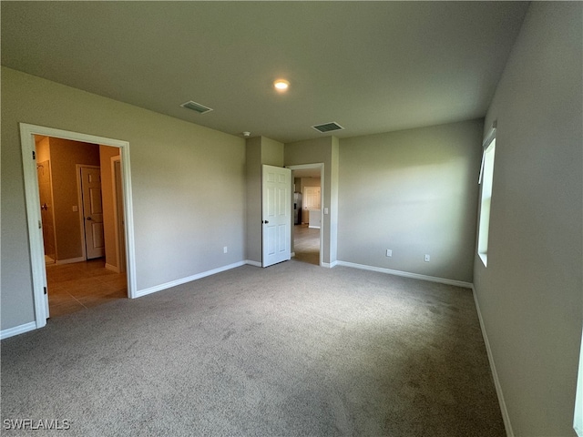 unfurnished bedroom featuring carpet floors