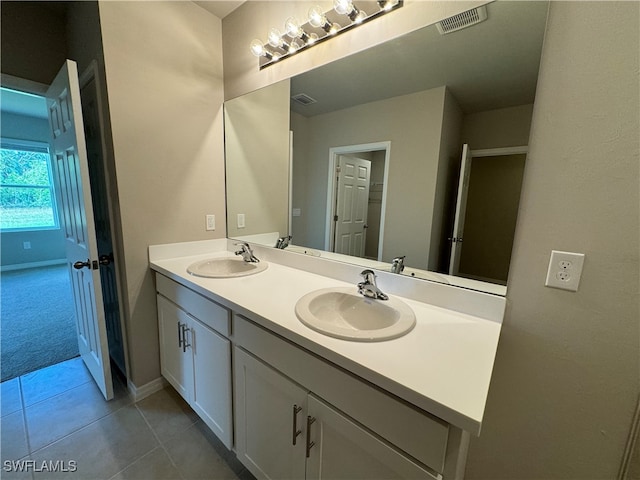 bathroom featuring vanity and tile patterned floors