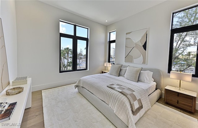 bedroom featuring light wood-type flooring