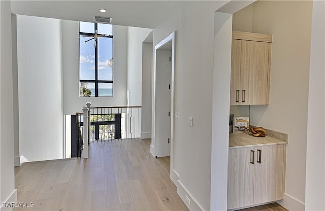 hallway featuring light hardwood / wood-style floors