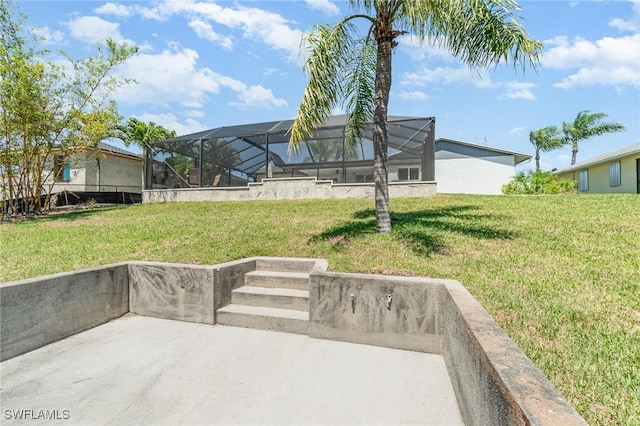 view of yard with glass enclosure